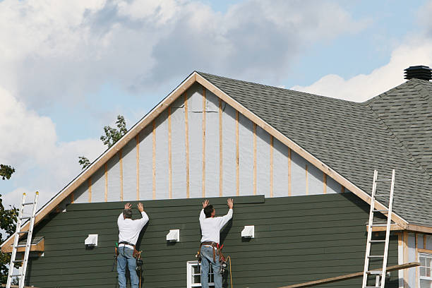 Professional Siding Installation technician working in Hyde Park, PA